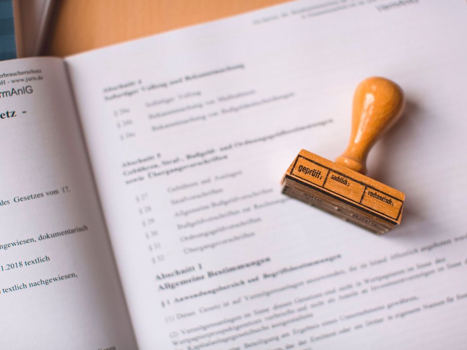 A rubber stamp on official certificate documents