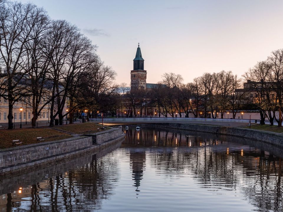 Turku Cathedral and the Aura River at dusk