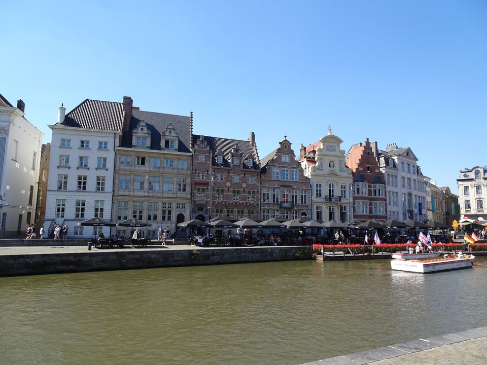 Historic guild houses along the Graslei canal in Ghent