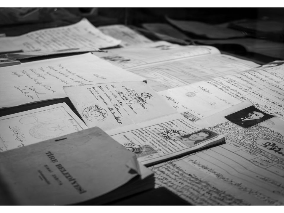 A stack of certificates and official documents